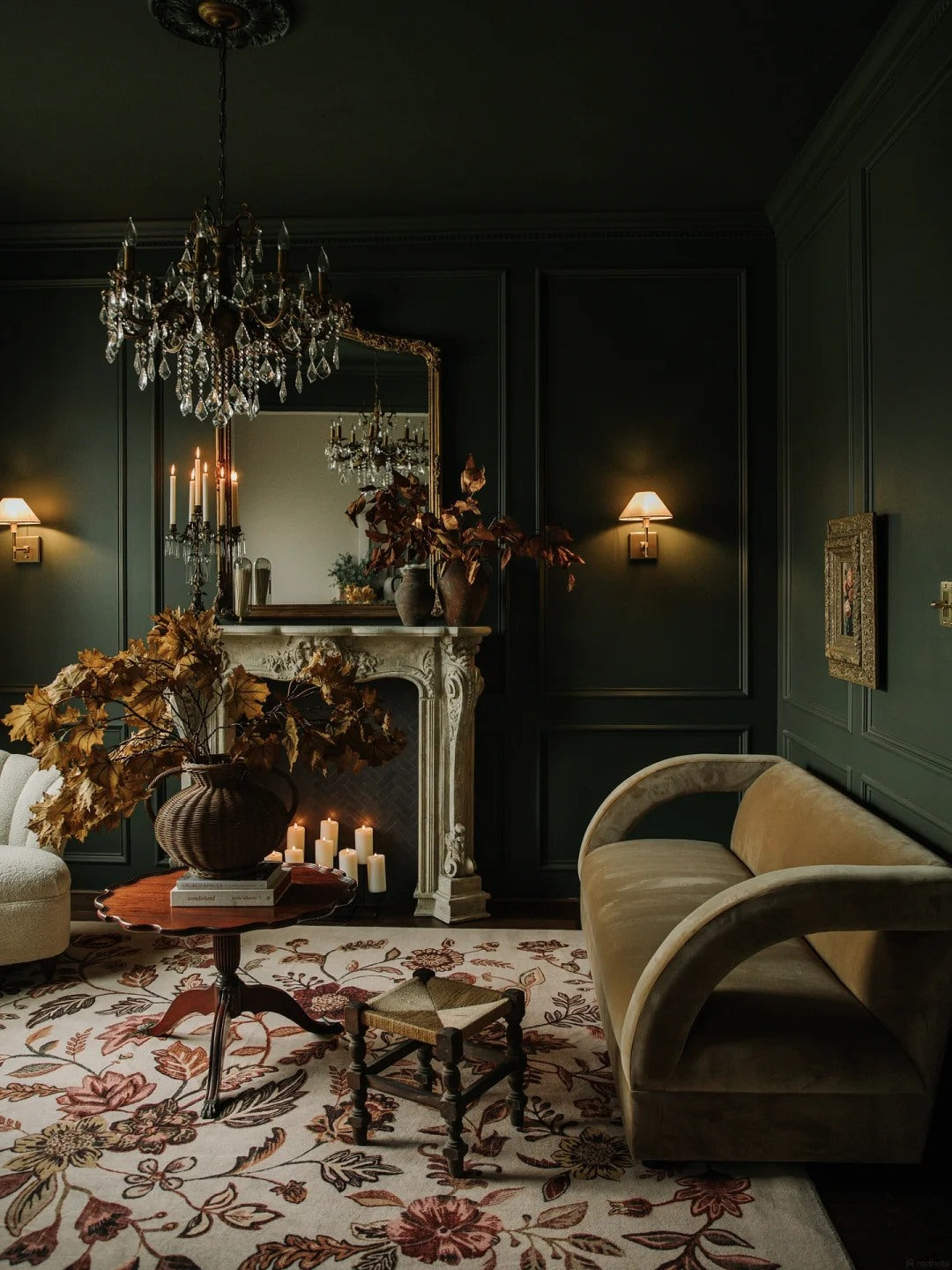 Soft upholstery and candlelight bring warmth into a deeper palette.