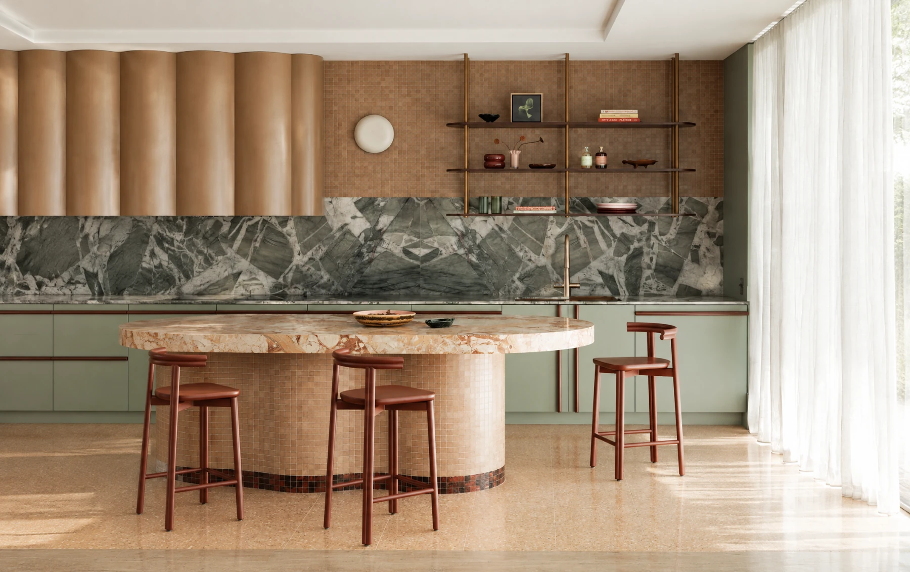 Completed kitchen combining timber cabinetry, sage-green doors, stone surfaces and bronze hardware