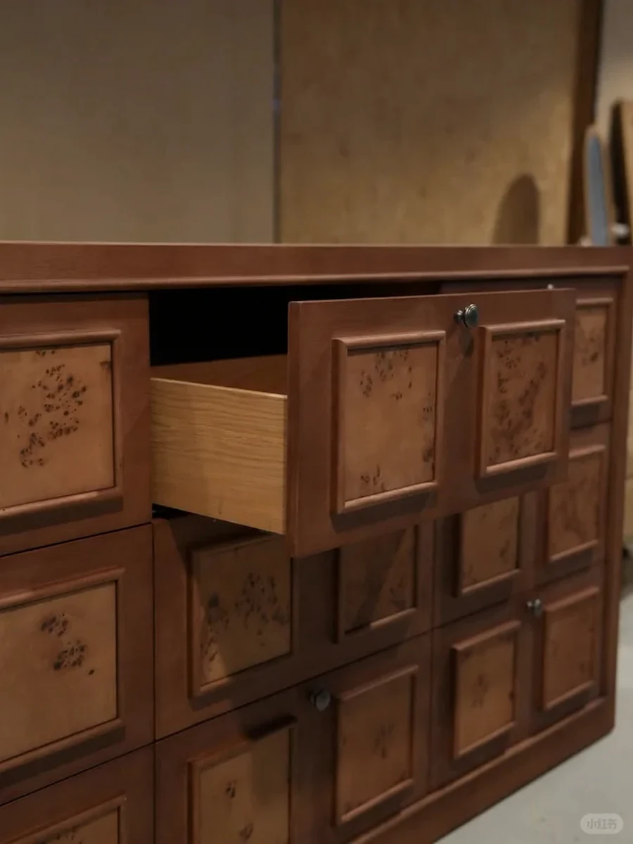 Open timber drawer showing its front, handle and internal drawer box