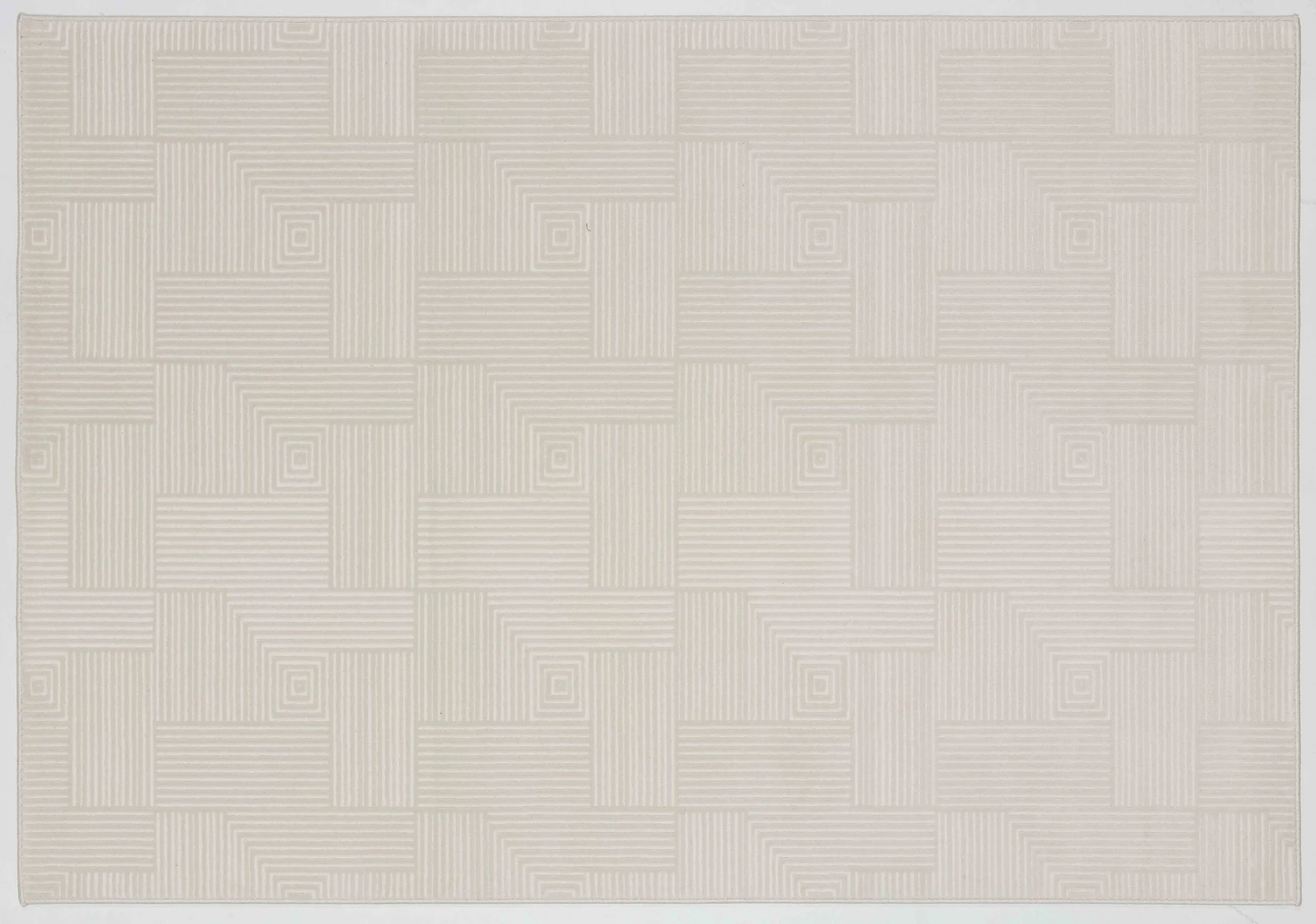 Whisper Atlas Area Rug in a finished interior.
