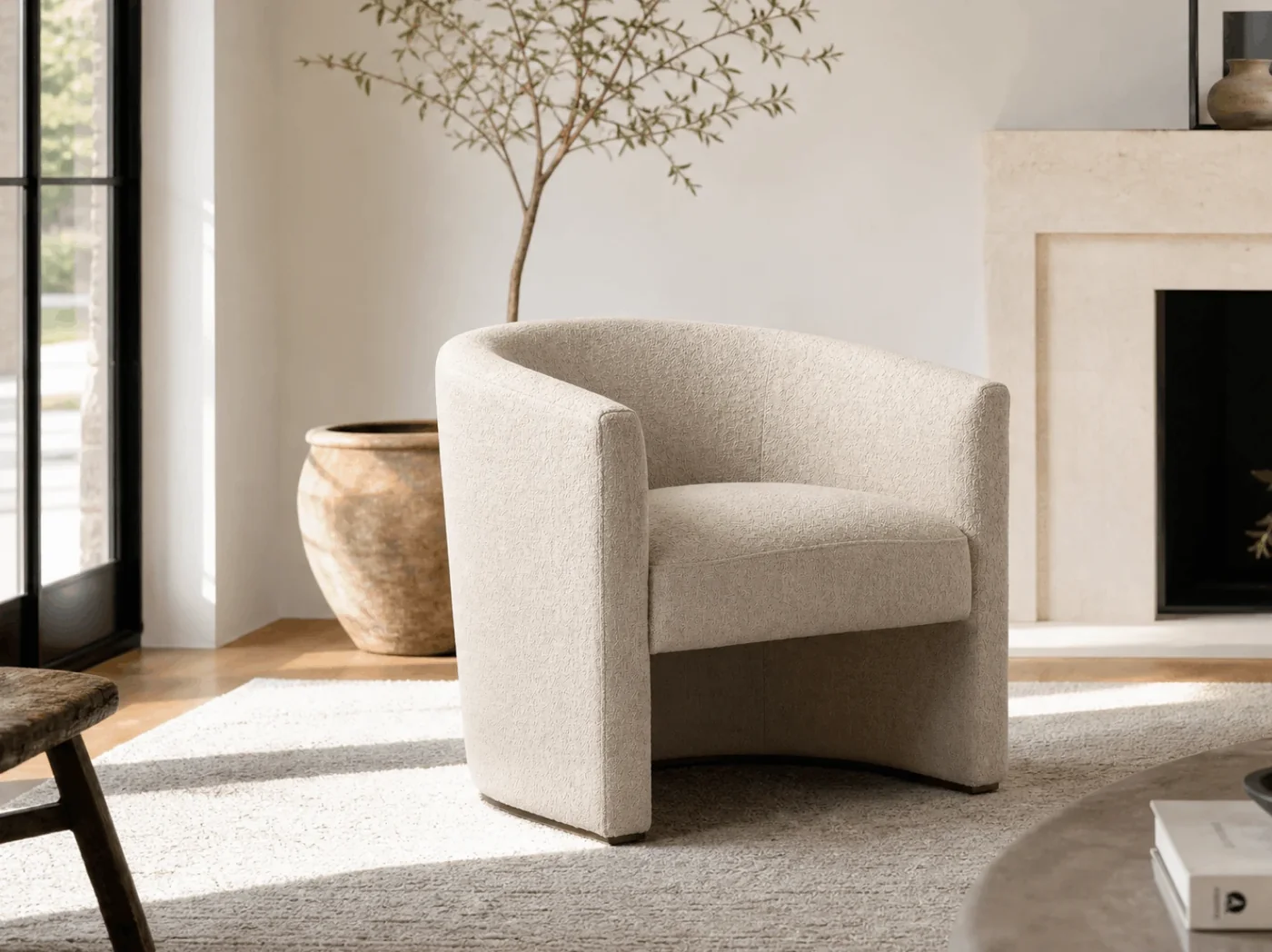 Boucle and leather lounge chairs