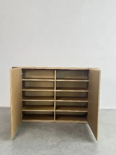 Open cabinet with separate compartments for item-level responsibility checks