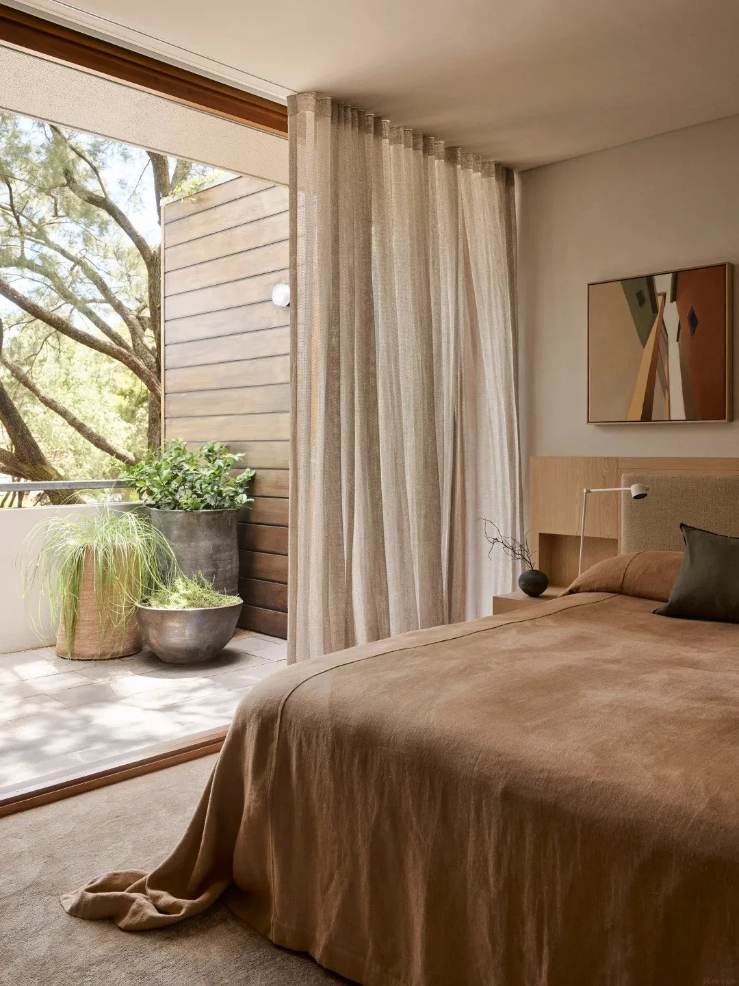 Let fabric soften a bedroom