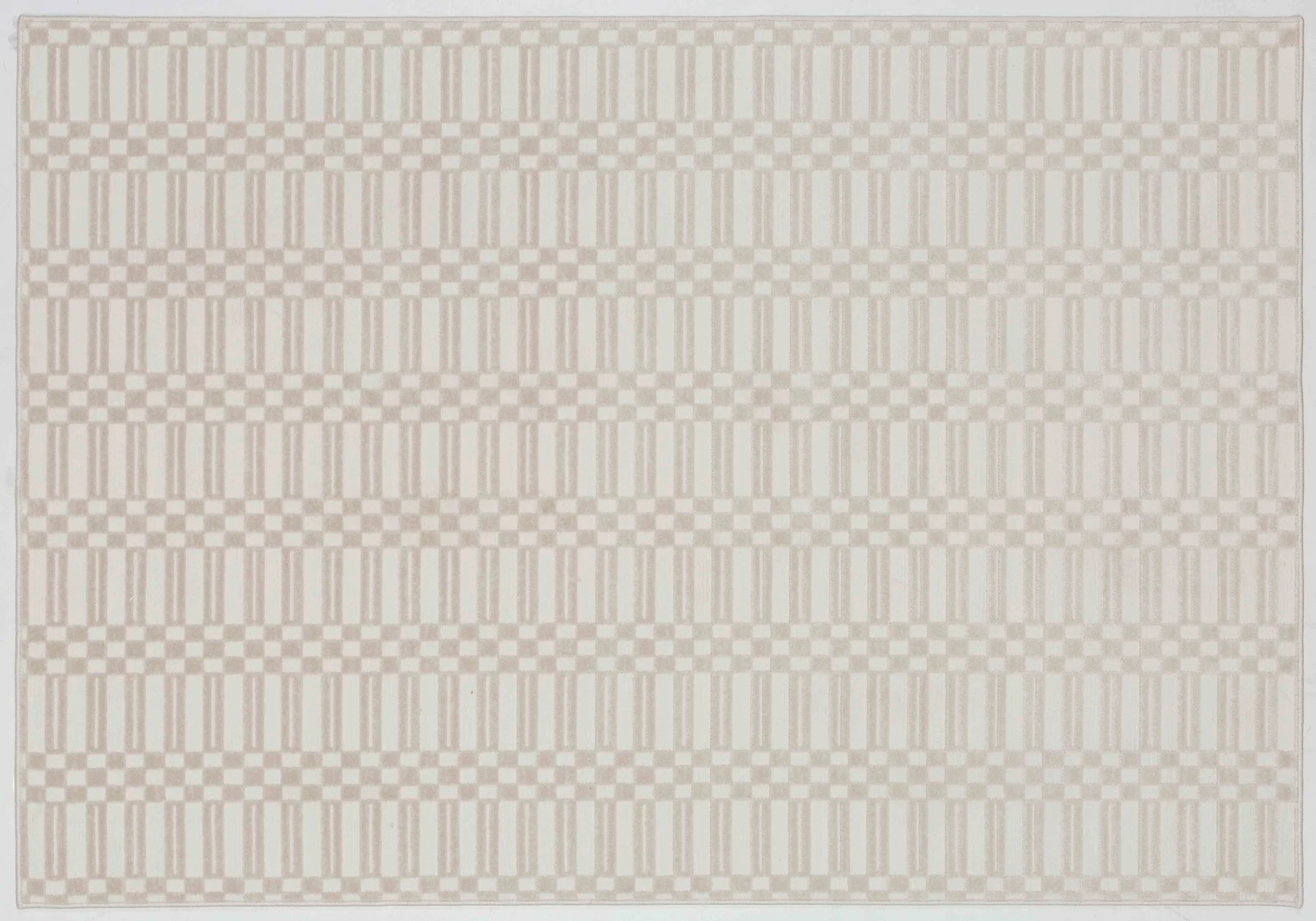 Whisper Cairn Area Rug in a finished interior.