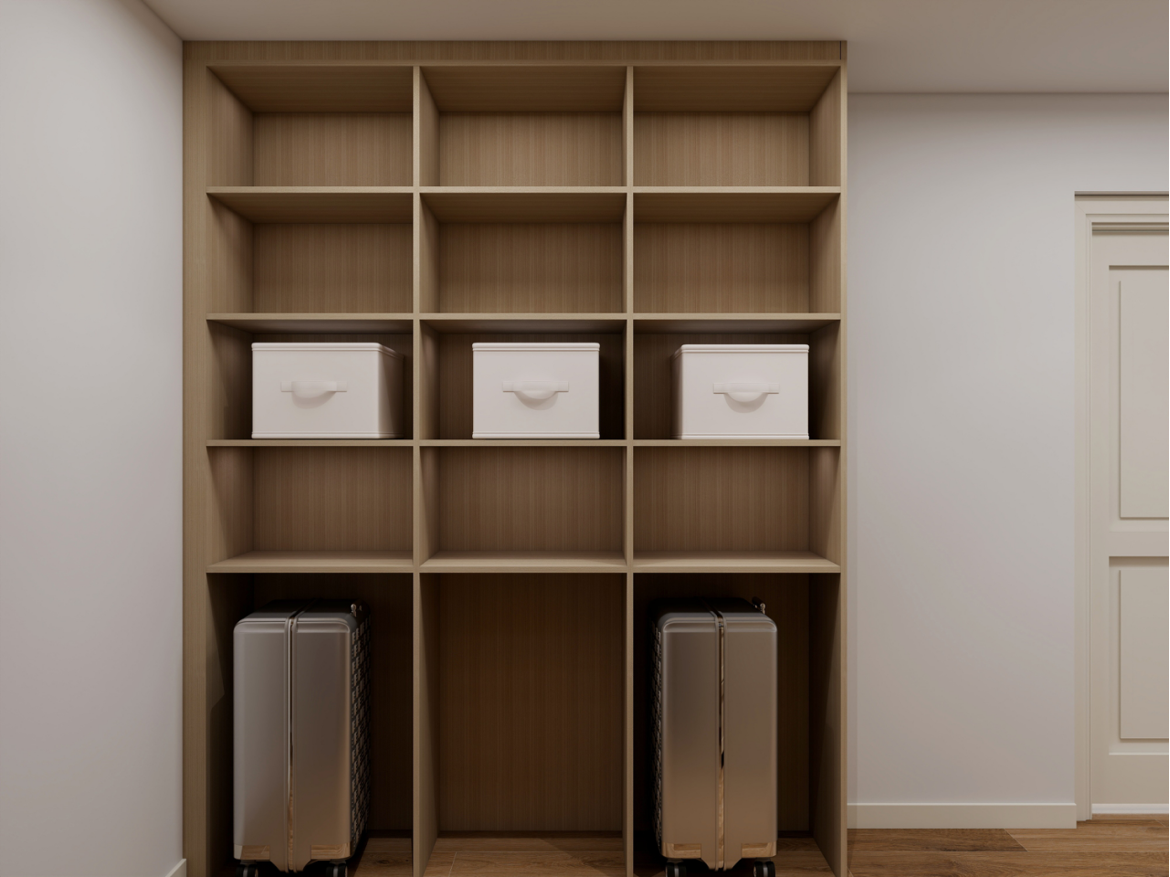 Render of the grid shelving unit with boxes above and luggage recesses below