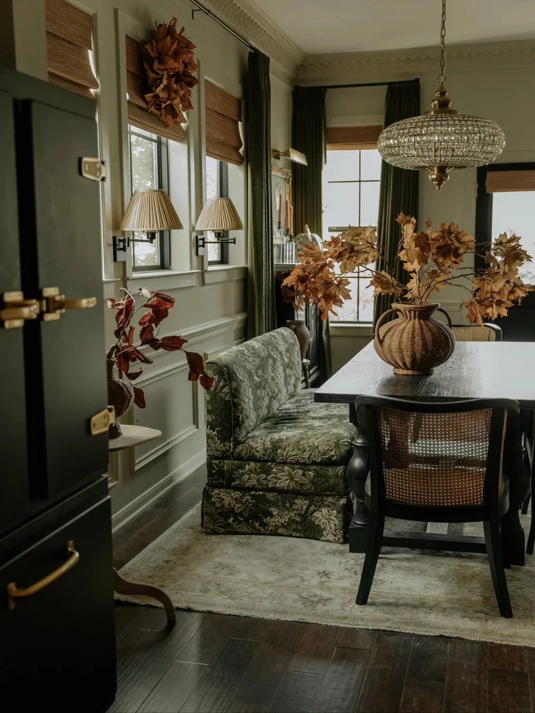 Plants, mirrors, and wood surfaces bring dimension to a quiet corner.