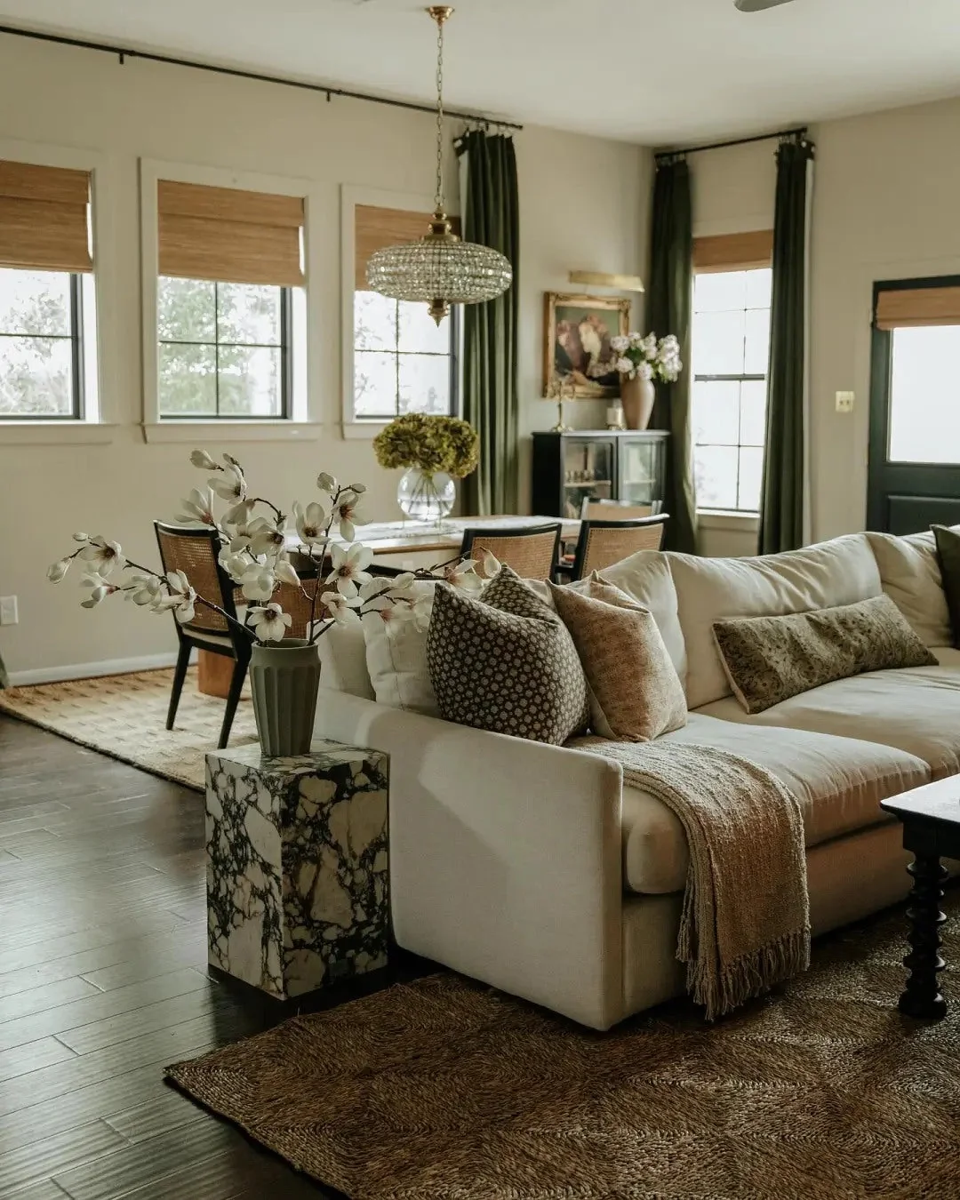 A gallery wall and substantial storage piece create a strong focal side.