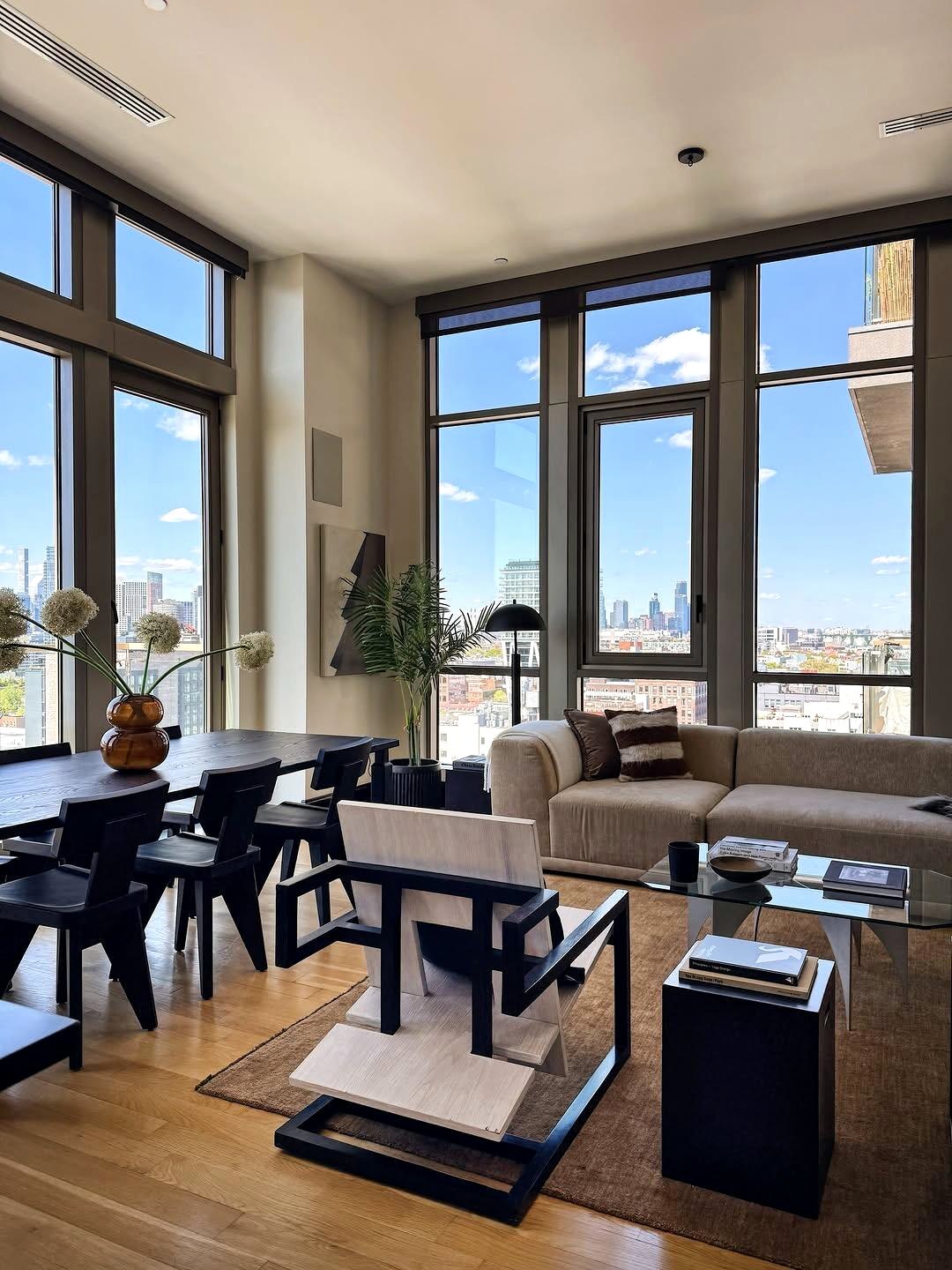 Seating area beside tall windows