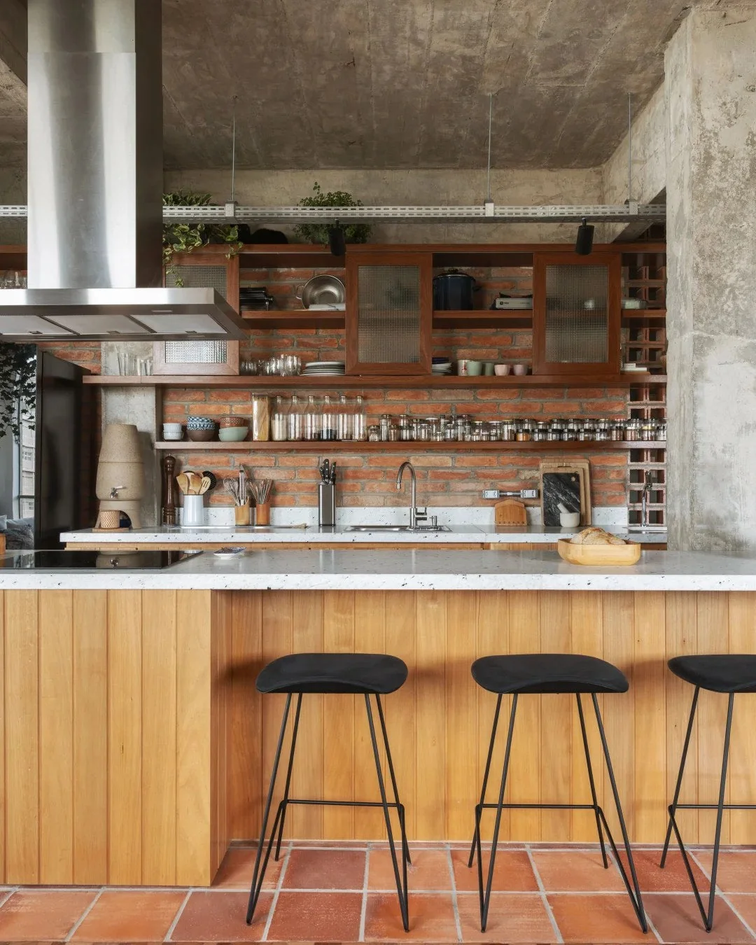 Use wood fronts to soften concrete and metal