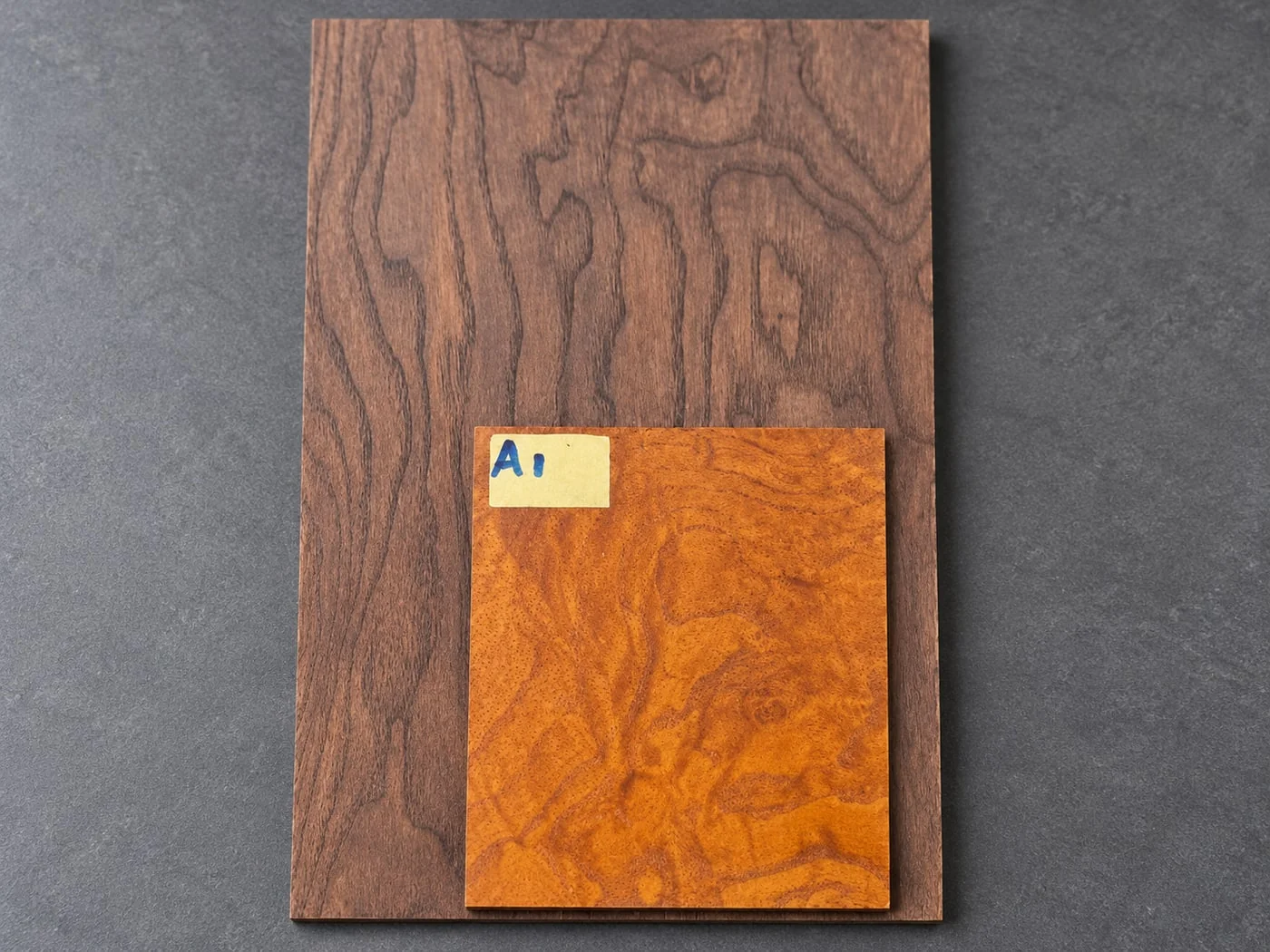 Two timber finish samples with an A1 reference label; AI-edited material selection reference
