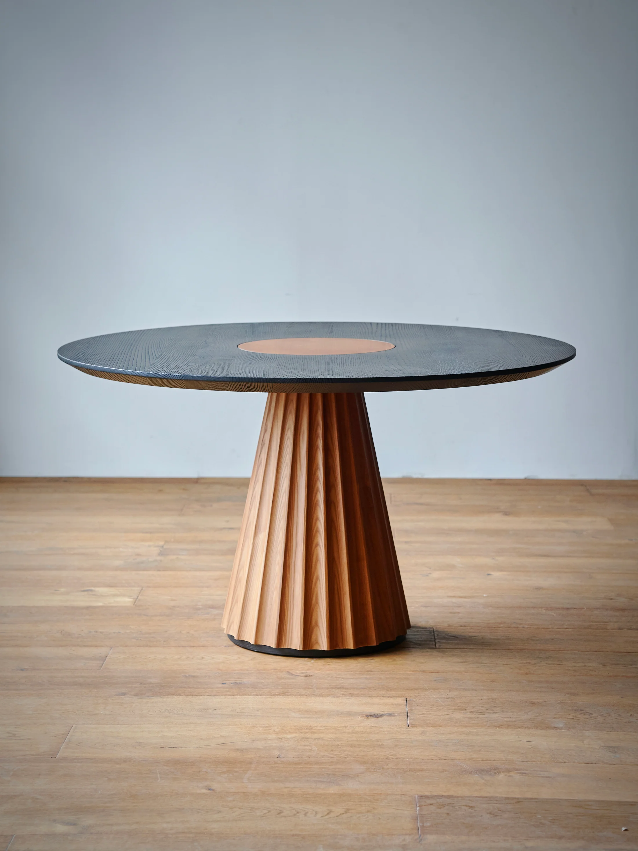 Iris Crest Dining Table in a finished interior.