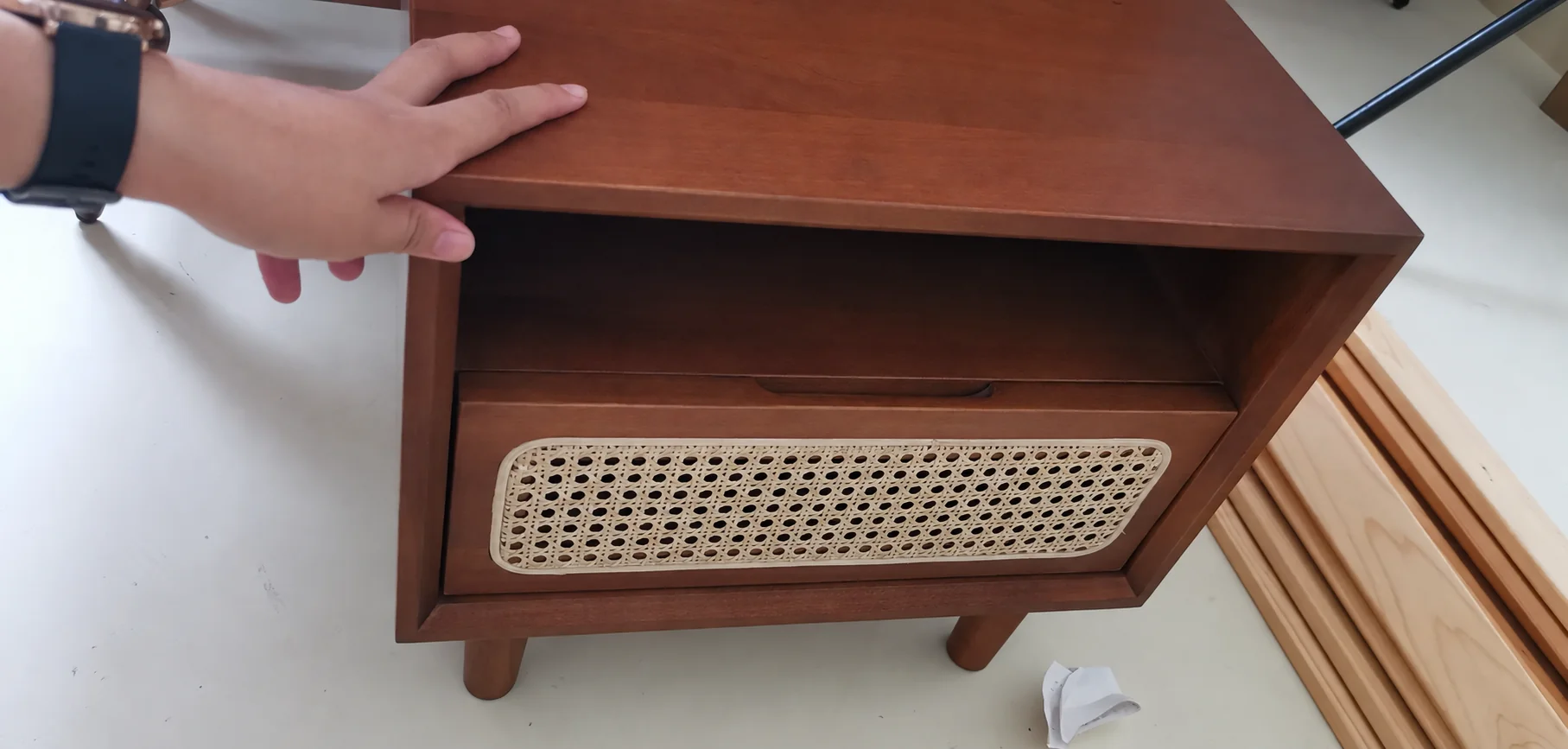 Wood bedside cabinet with a woven rattan front