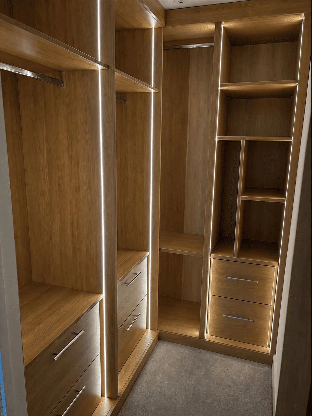 Amber Collection full wardrobe with warm wood finishes and integrated lighting