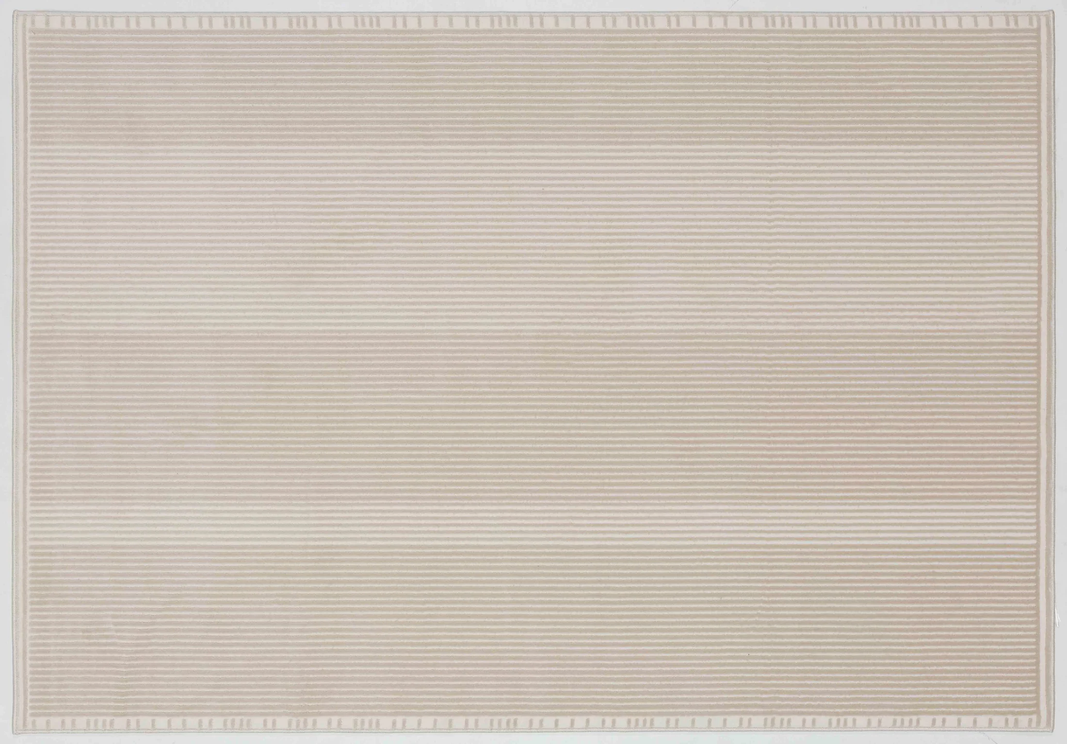 Whisper Cove Area Rug in a finished interior.