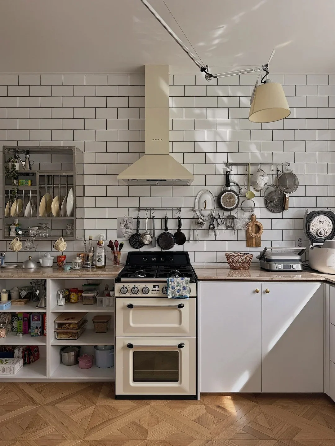 Mix closed cabinets with hardworking open shelves